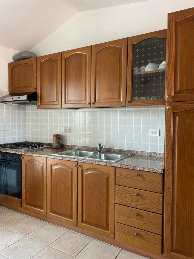 La Casa Di Tonia Apartment La Caletta Bagian luar foto